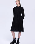 S·DEER black shirt dress, showcasing its flowy pleated silhouette and flattering waistline, adding a timeless and sophisticated touch to any wardrobe